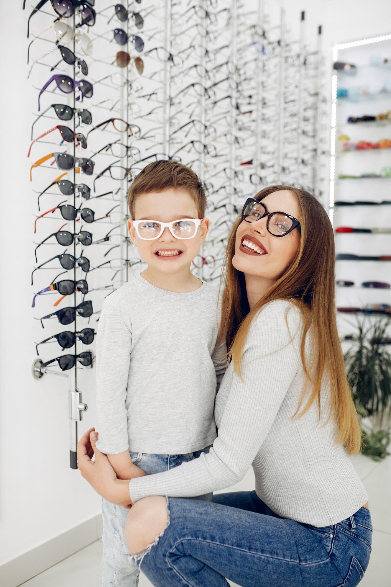 mother-with-little-son-glasses-store