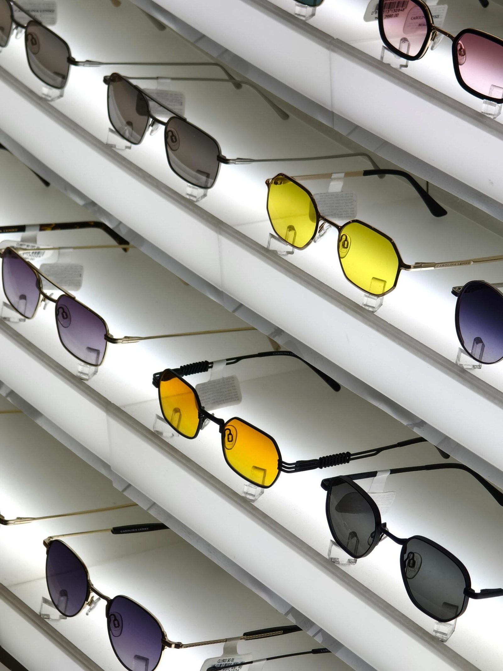 there-are-multiple-pairs-sunglasses-arranged-neatly-shelf