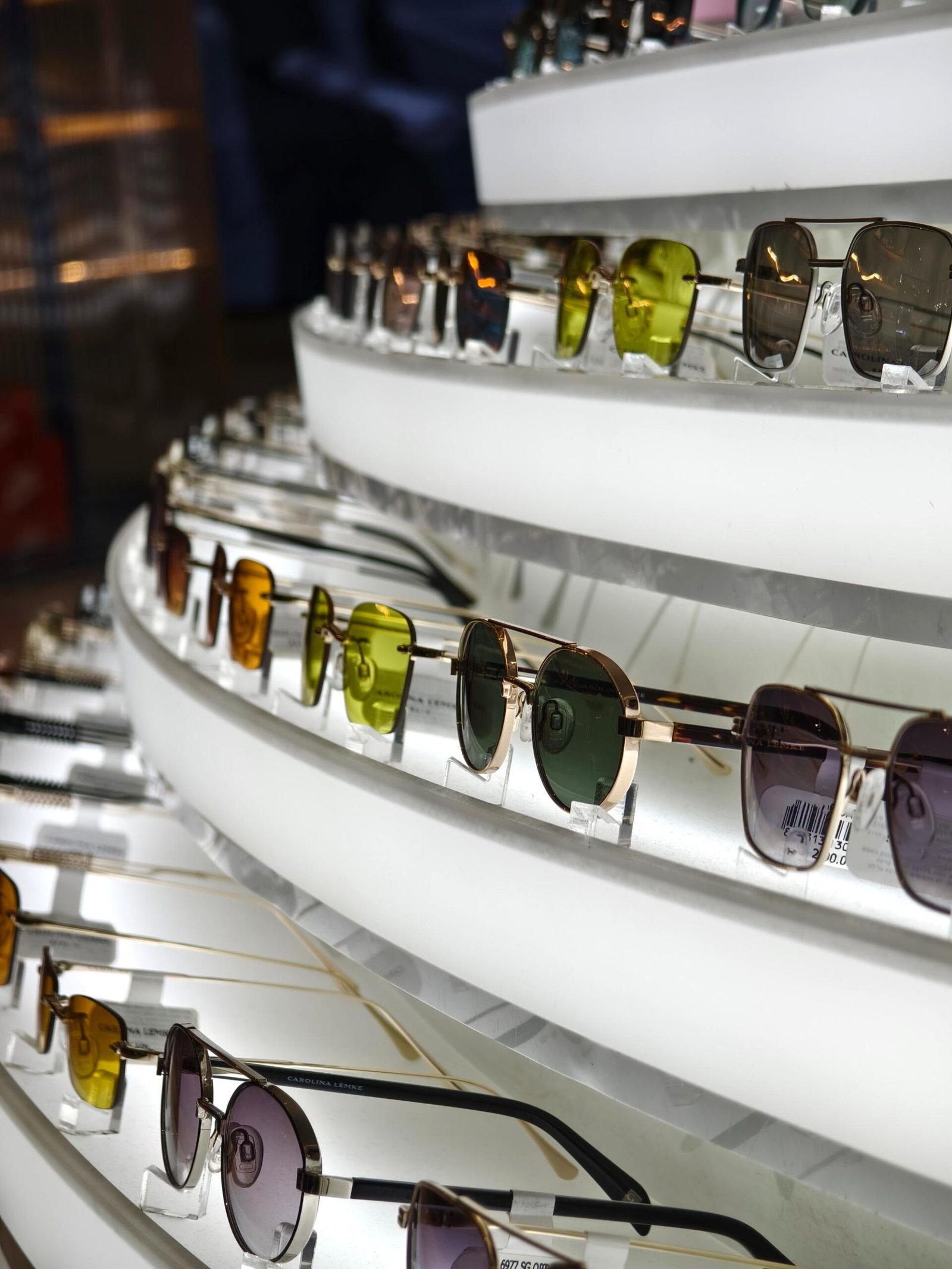 there-are-multiple-pairs-sunglasses-arranged-neatly-shelf